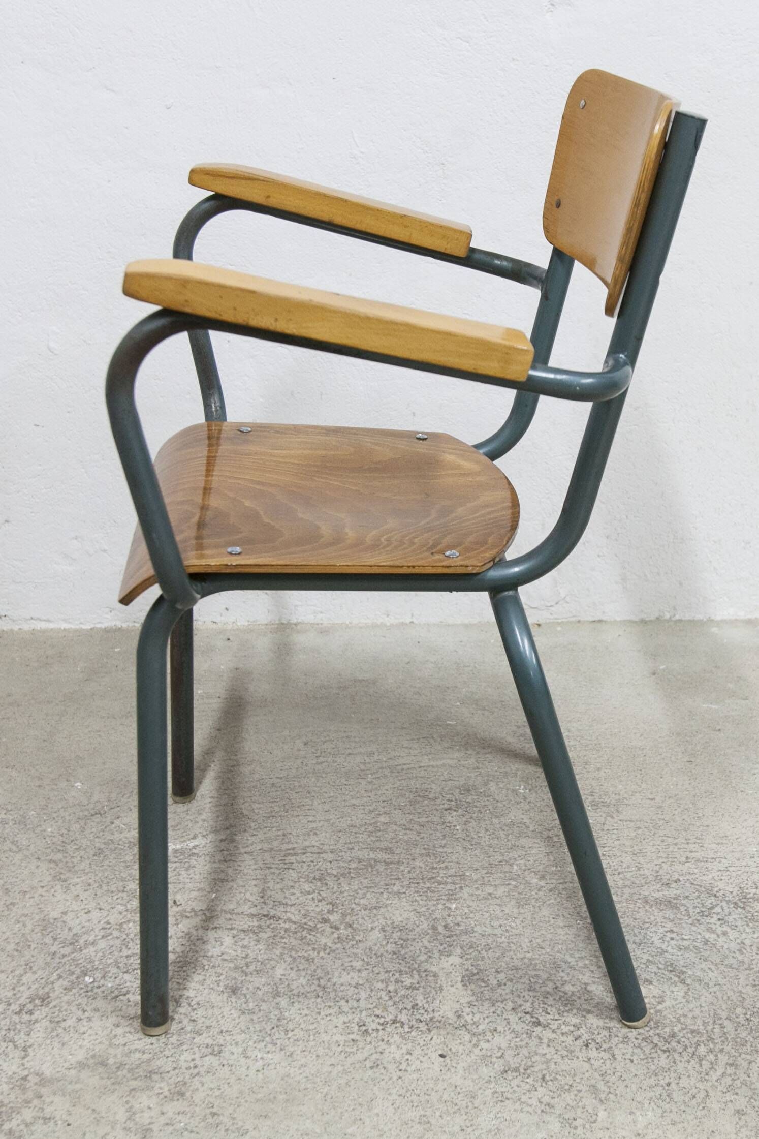 1962 school teacher's chair in honey color and tubular structure