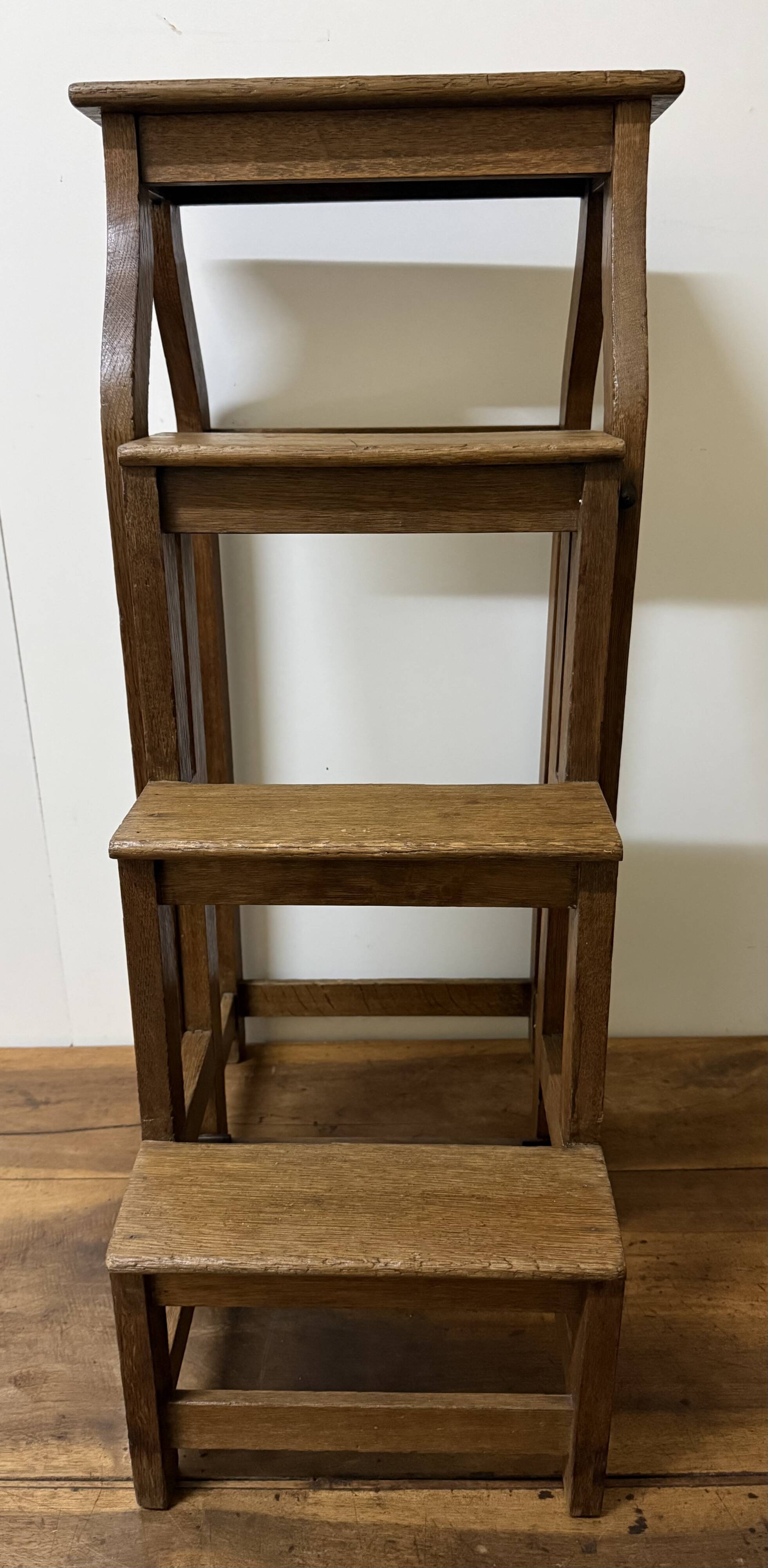 Stool transforming into a step ladder.