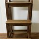 Stool transforming into a step ladder.