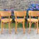 Trio de chaises cannées de style Bauman en hêtre non estampillées.