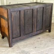 Louis XV style commode in rosewood and palisander veneer, gilt bronze mounts, and Rance marble top.