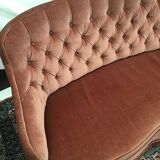 Pale pink tufted back toad sofa