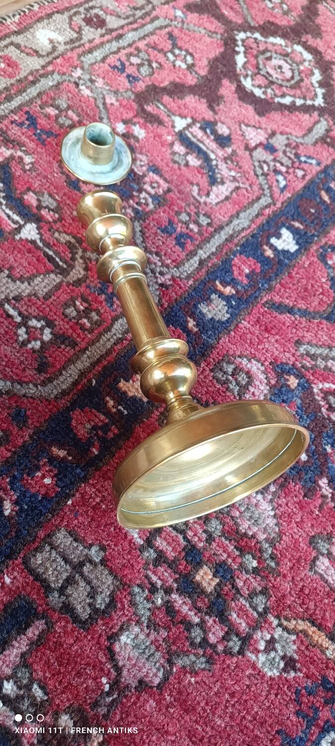 Bronze candlestick or torch holder from the Louis XIV period, France, 17th century.