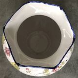 Round earthenware vase with polychrome floral motifs, signed