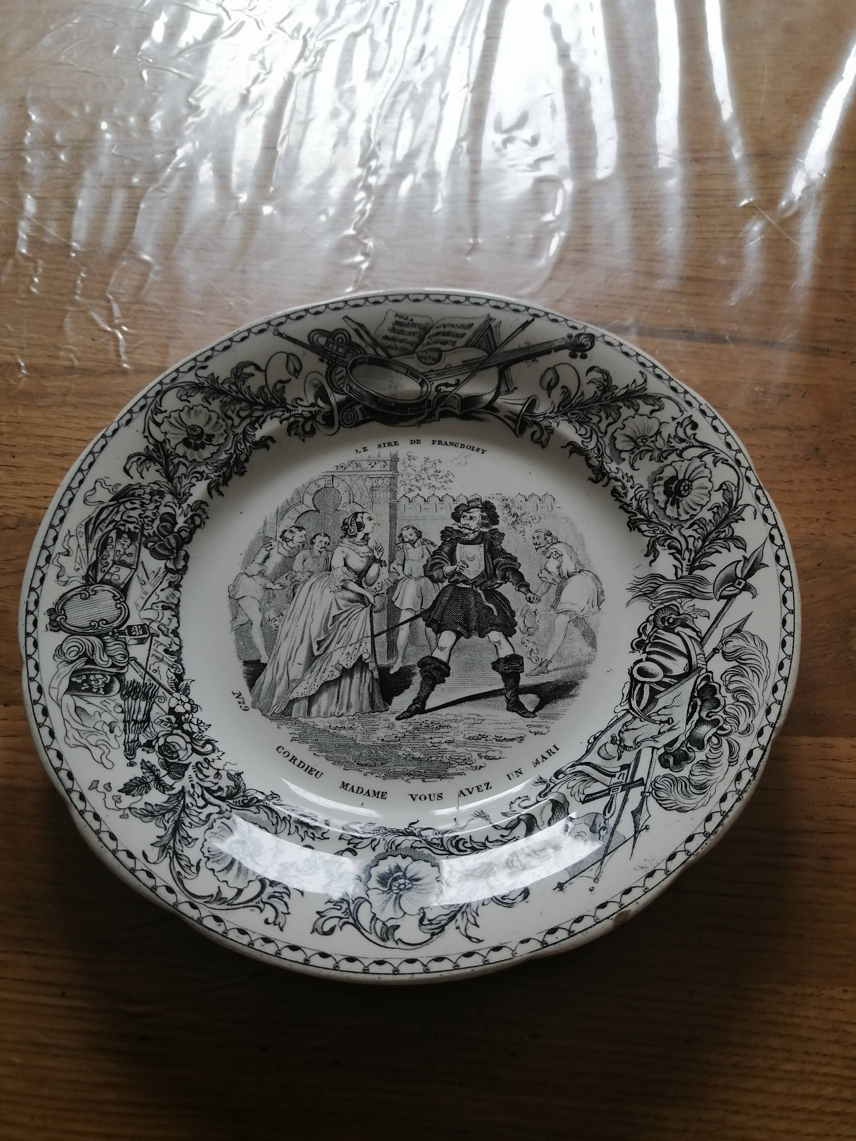 Set of eight talking plates