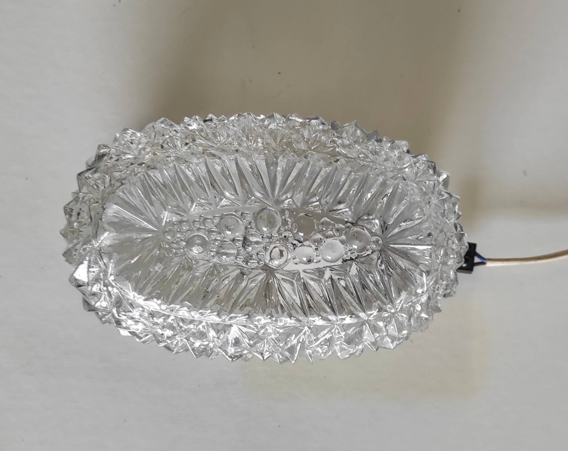 Ceiling light or oval wall light in moulded glass - mid 20th century.