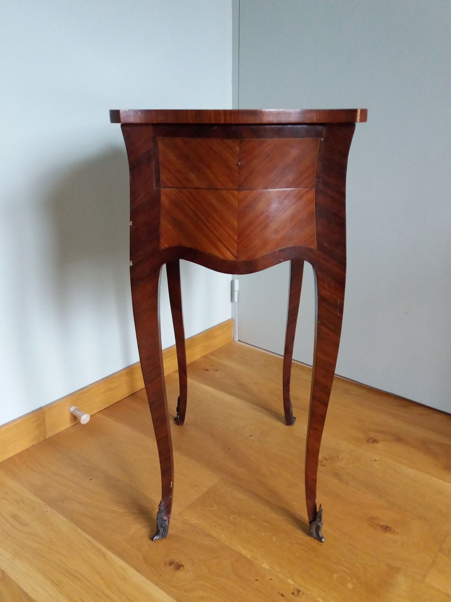Nightstand with writing desk in Louis XV style.