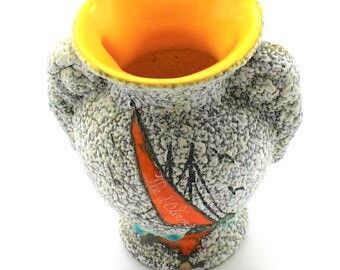 small ancient ceramic vase