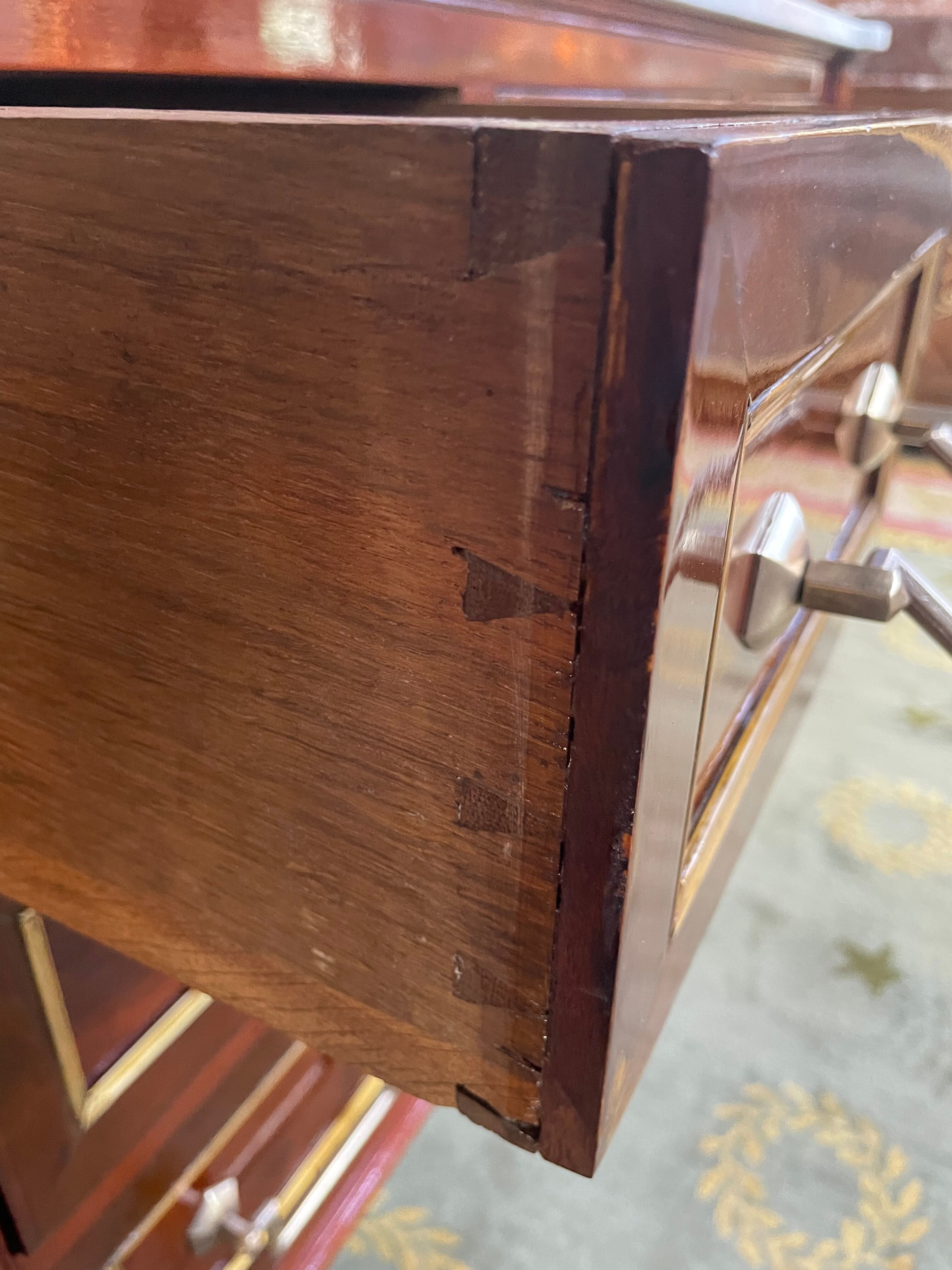Louis XVI style chest of drawers in mahogany and amaranth