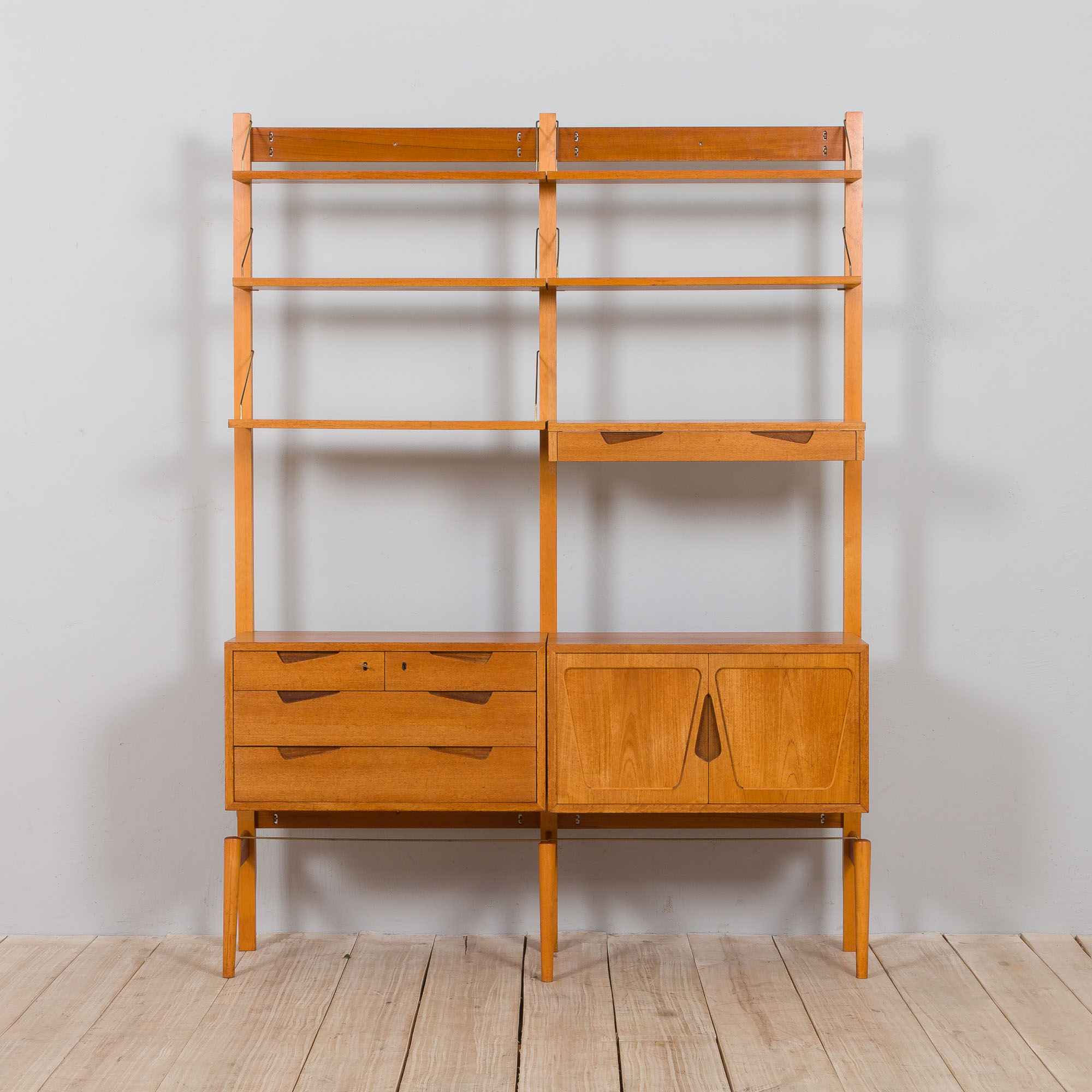 Rival 2 bay teak wall unit with 3 cabinets and 5 shelves by Brodrene Jatogs Norway, Kjell Riise, 196