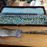 Filled silver pie shovel