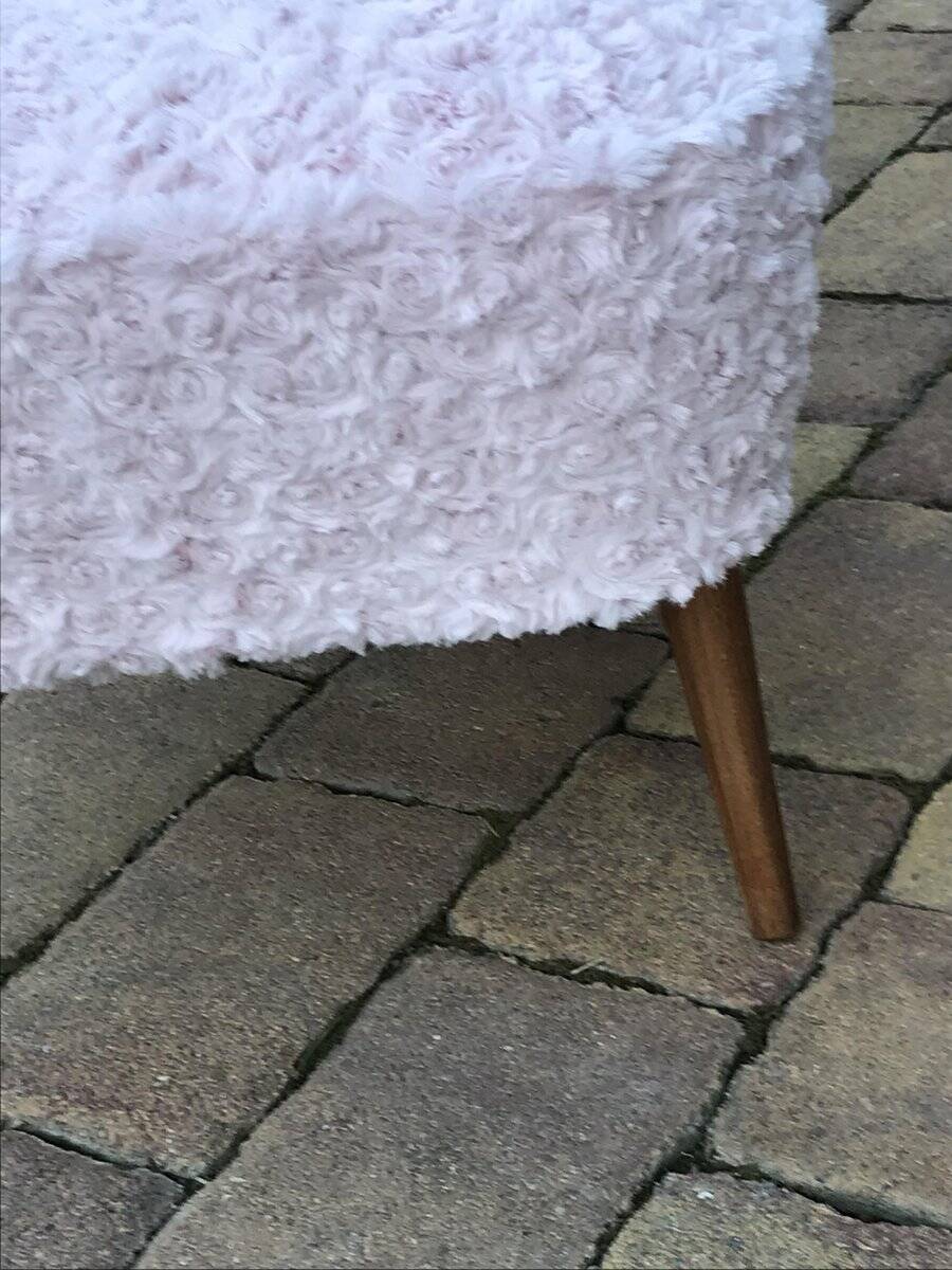 Mid-century cocktail chair in pink faux fur, solid beech legs, vintage style.