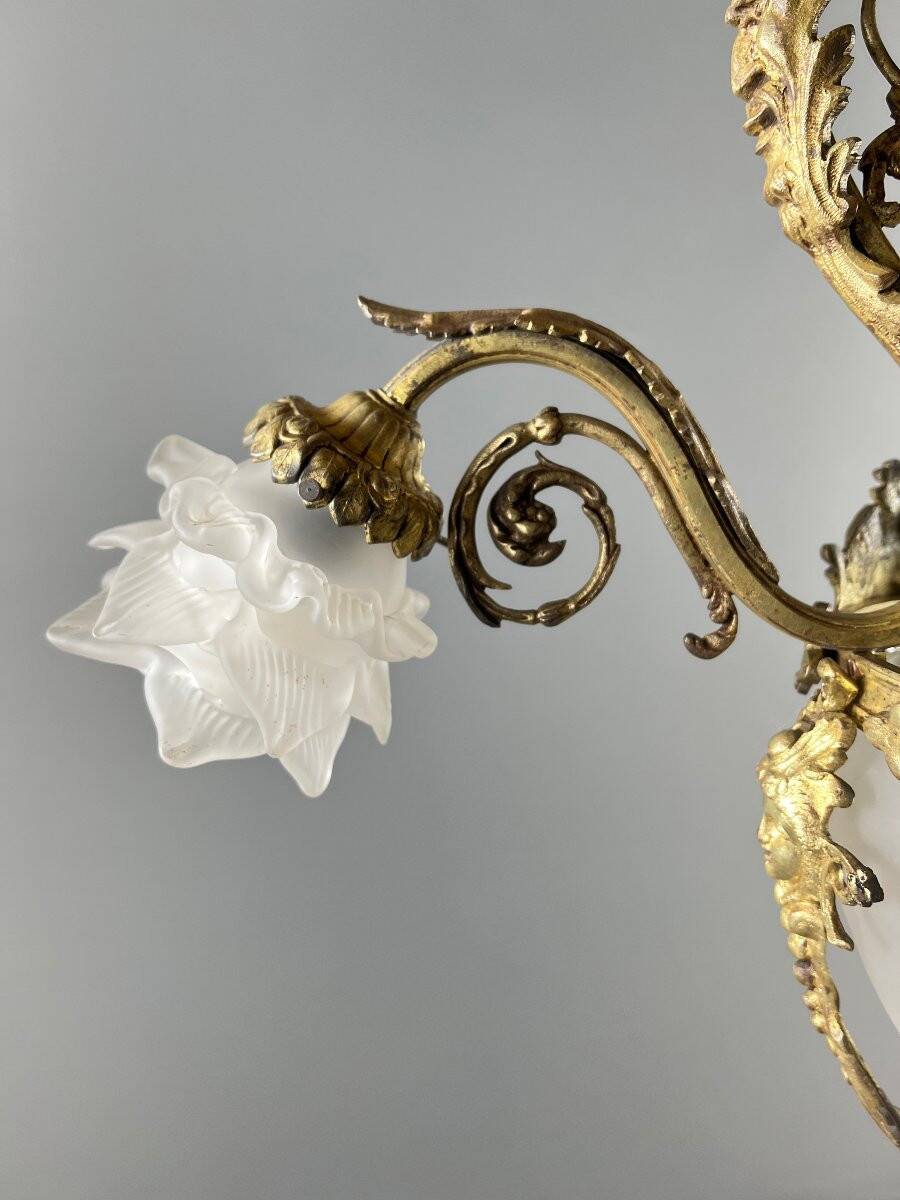 Louis XV style chandelier in bronze and glass, 19th century