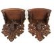 Pair of carved wooden wall consoles decorated with a deer's head