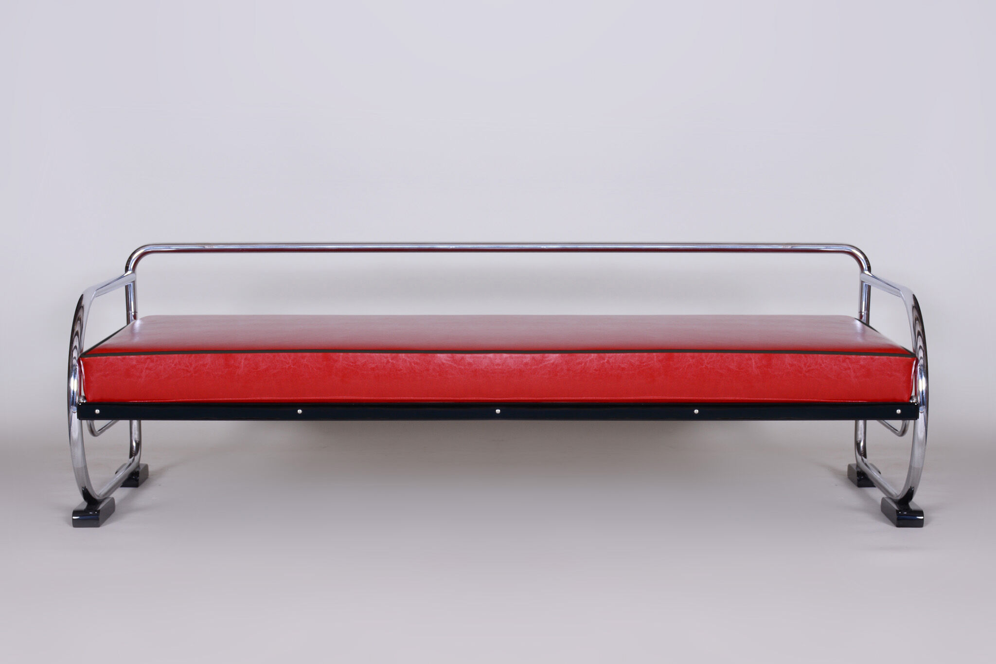 Red Slezak leather sofa made in 1930s Czechia