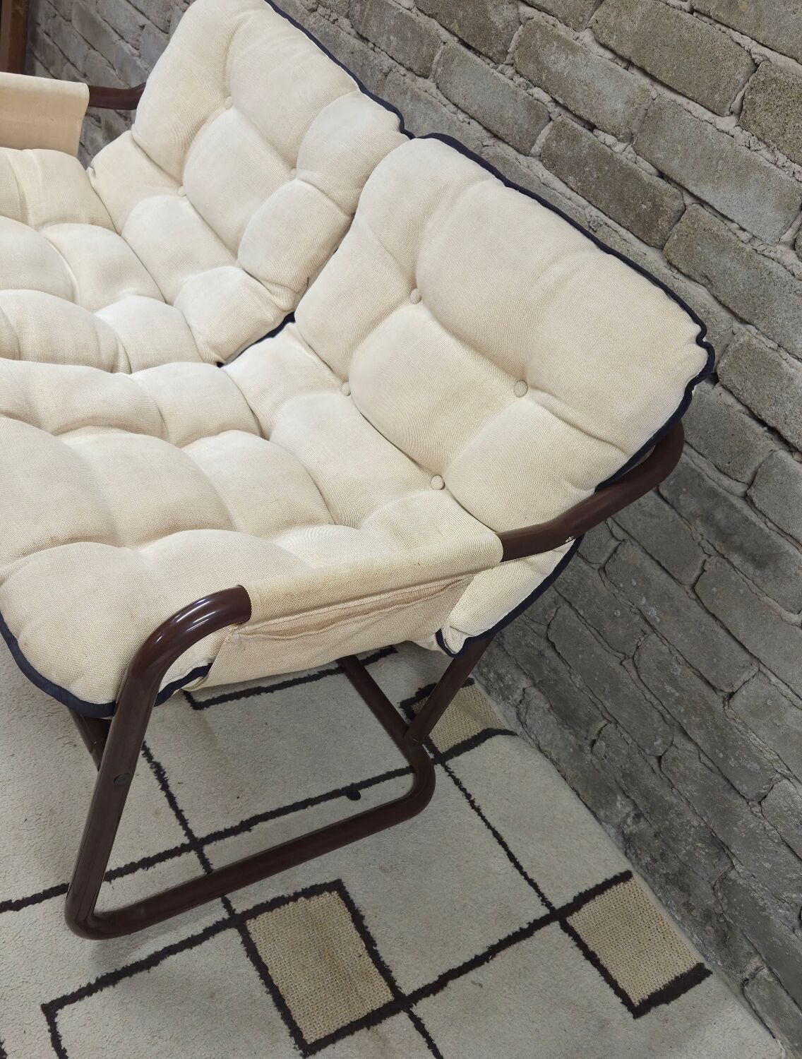 Tubular two-seater bench from the 1970s.