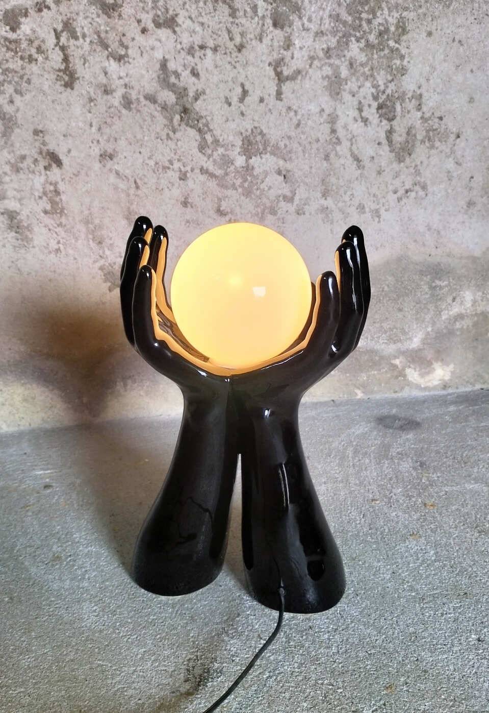 Black and white opaline hand lamp.