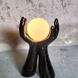 Black and white opaline hand lamp.