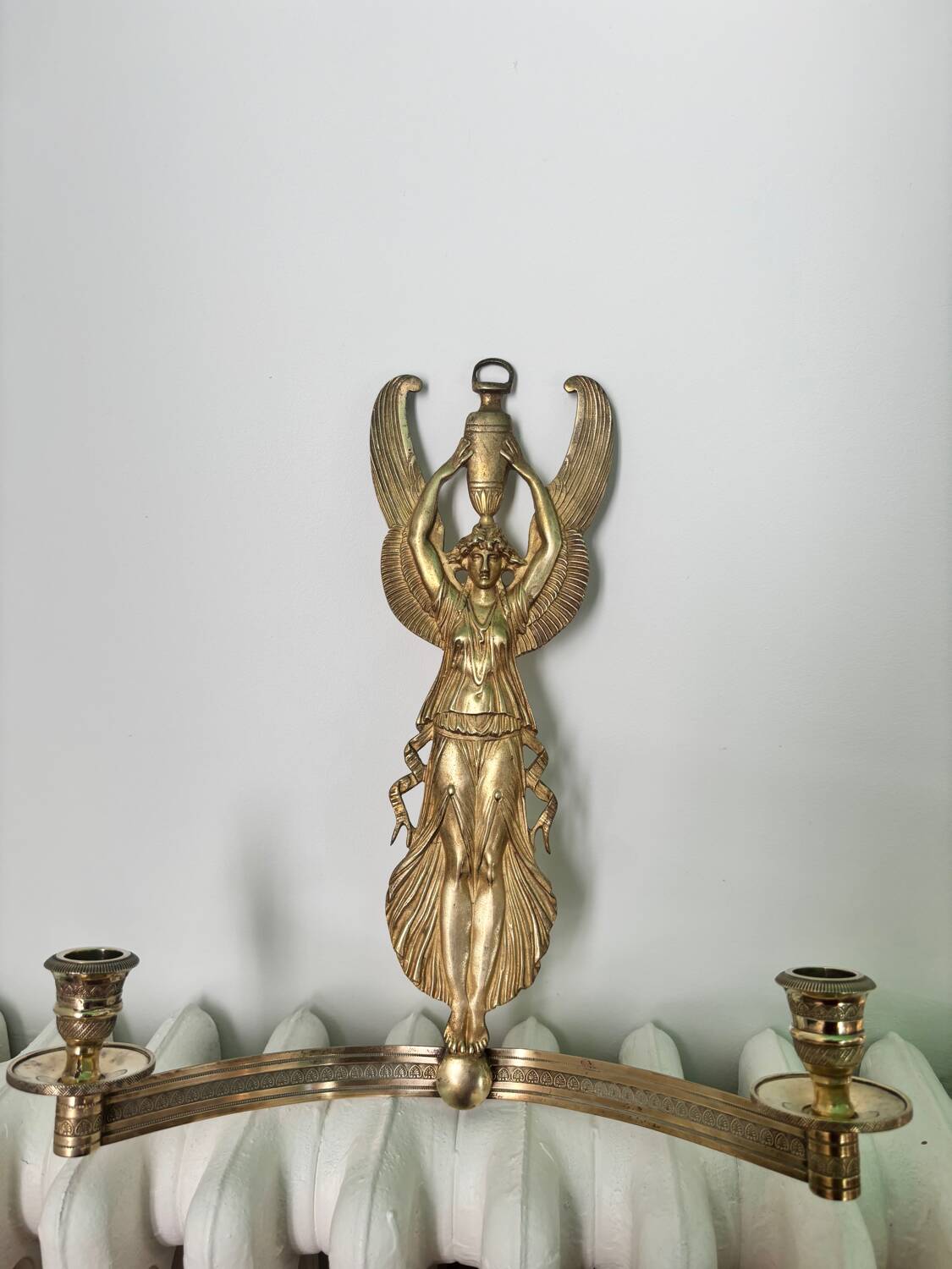 Large candlestick with winged caryatids