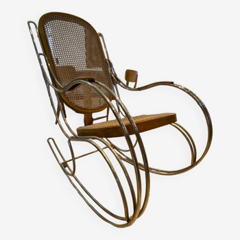 Vintage rocking chair in steel and canework