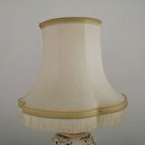 Table lamp with wooden base and fringed shade