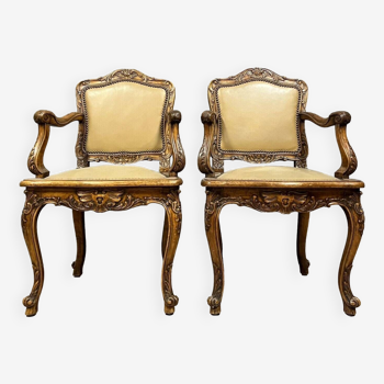 Pair of curved Louis XV office armchairs in walnut circa 1920