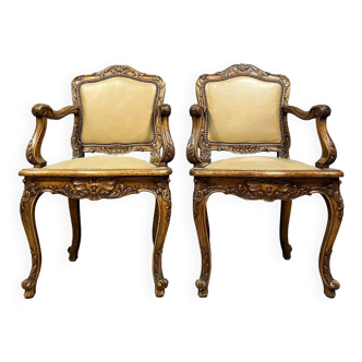 Pair of curved Louis XV office armchairs in walnut circa 1920