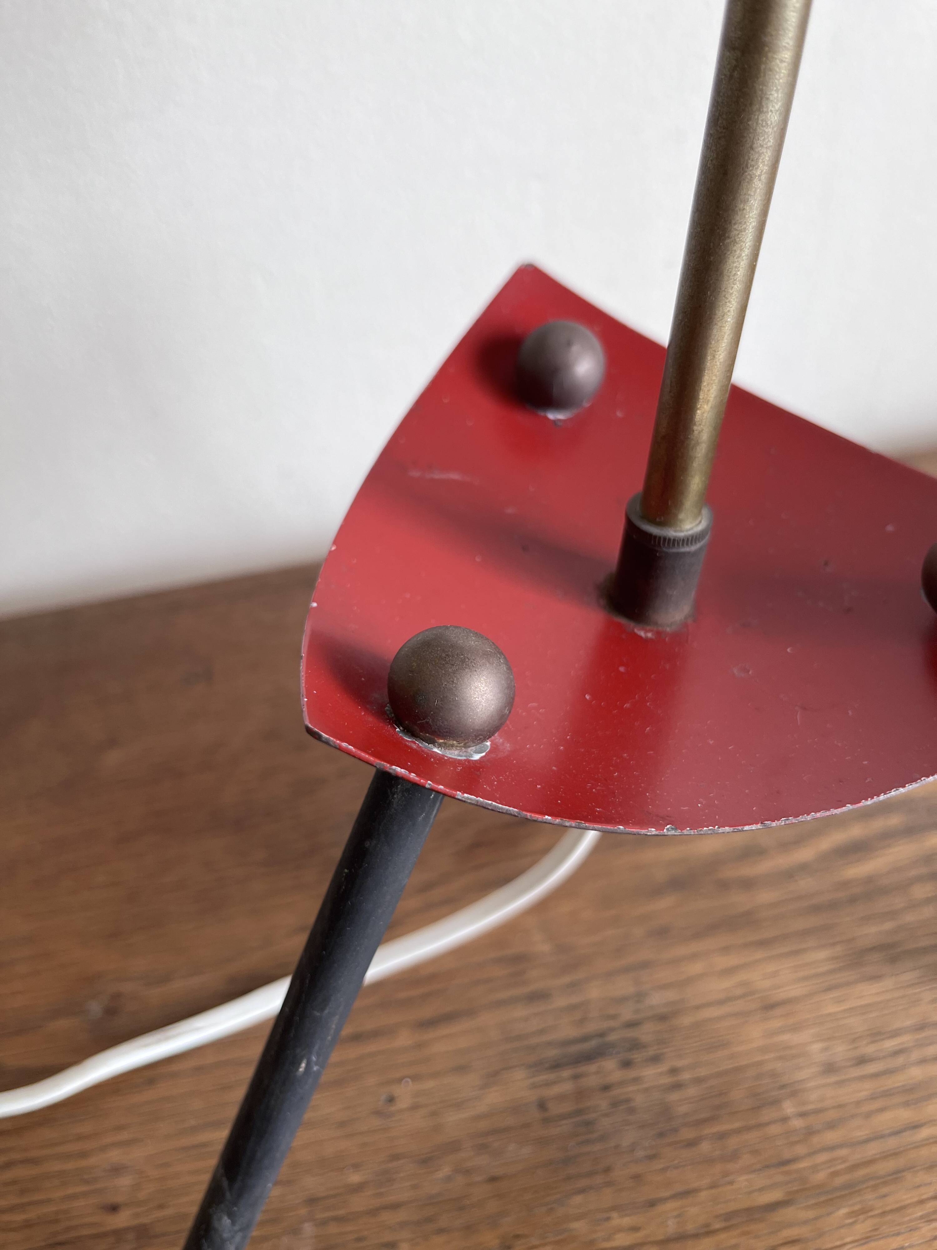 1950s modernist tripod lamp made of sheet metal and brass.