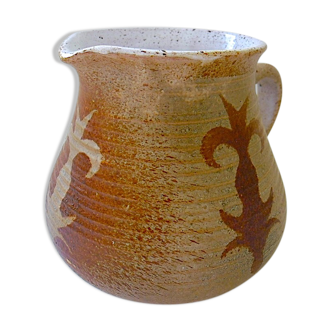 Red sandstone pitcher, white enamelled interior, decorated with stencil