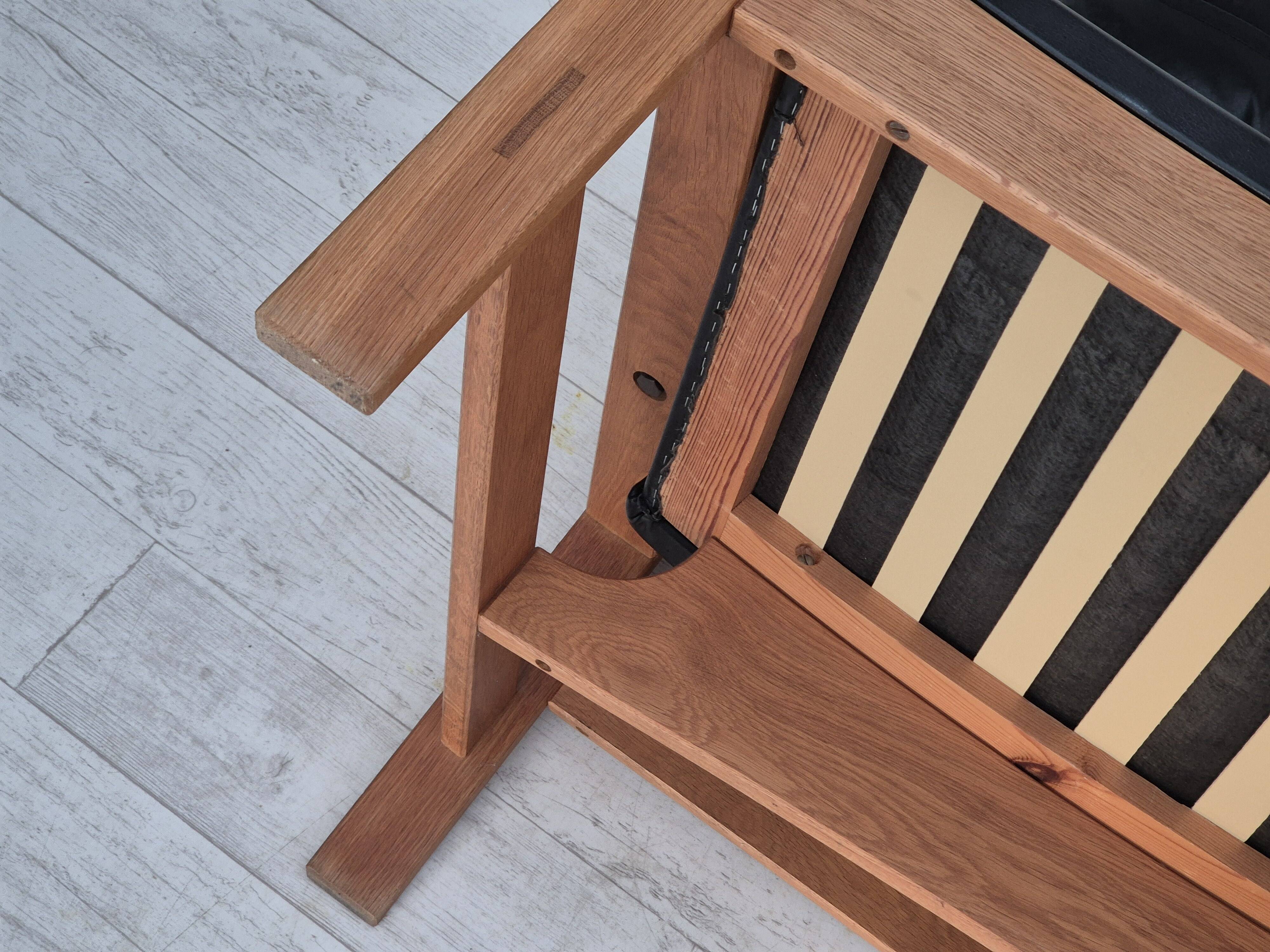 1960s, Danish 2-seater sofa in original condition, furniture leather, solid oak wood.