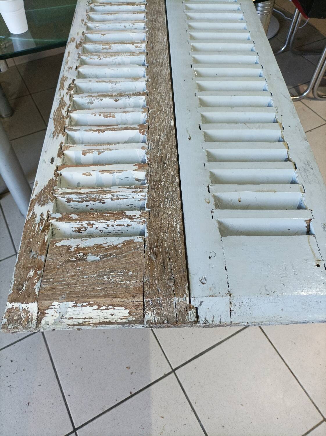 Louvered wooden shutter