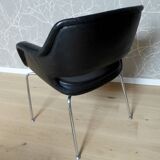 Armchair with leather and chrome armrests