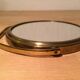 Vintage magnifiing gold round barber mirror