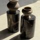 Small side table in black petrified wood with stripes and beige bottom H28.