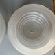 Translucent glass saucer suspension