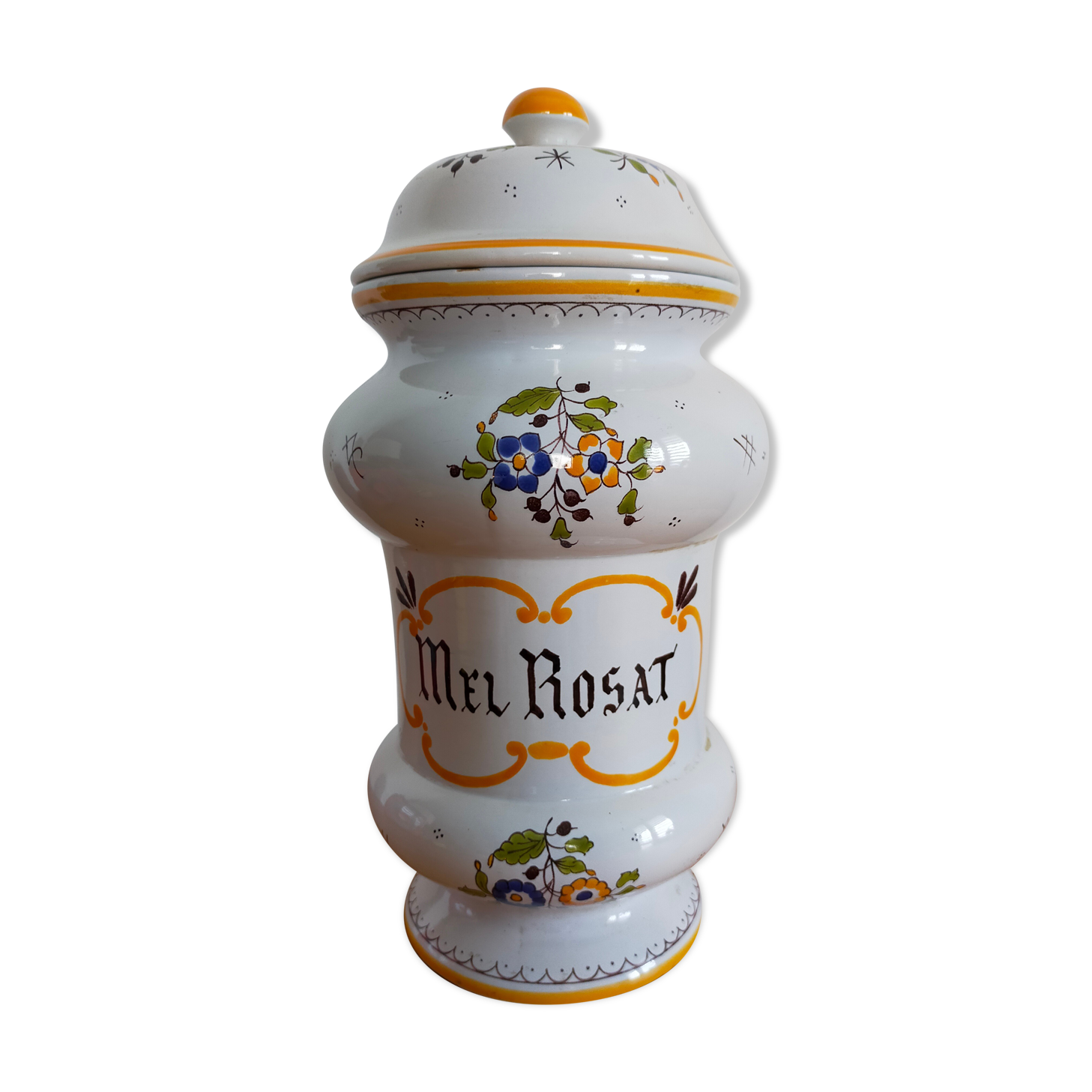 Vintage antique pharmacy jar in earthenware floral patterns