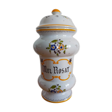 Vintage antique pharmacy jar in earthenware floral patterns