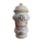 Vintage antique pharmacy jar in earthenware floral patterns