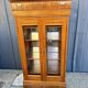 Two-door mahogany display cabinet