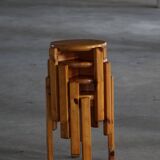 Mid-20th century, set of 4 vintage stackable pine stools, Danish design.