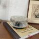 Round wall-mounted ceiling light, transparent moulded glass, vintage fixture.