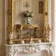 Miroir style Louis XV doré à la feuille d'or du XIXème, 181cm H