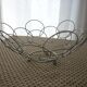 Fruit cut basket made of metal wire, ball feet