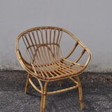 Rattan basket armchair.