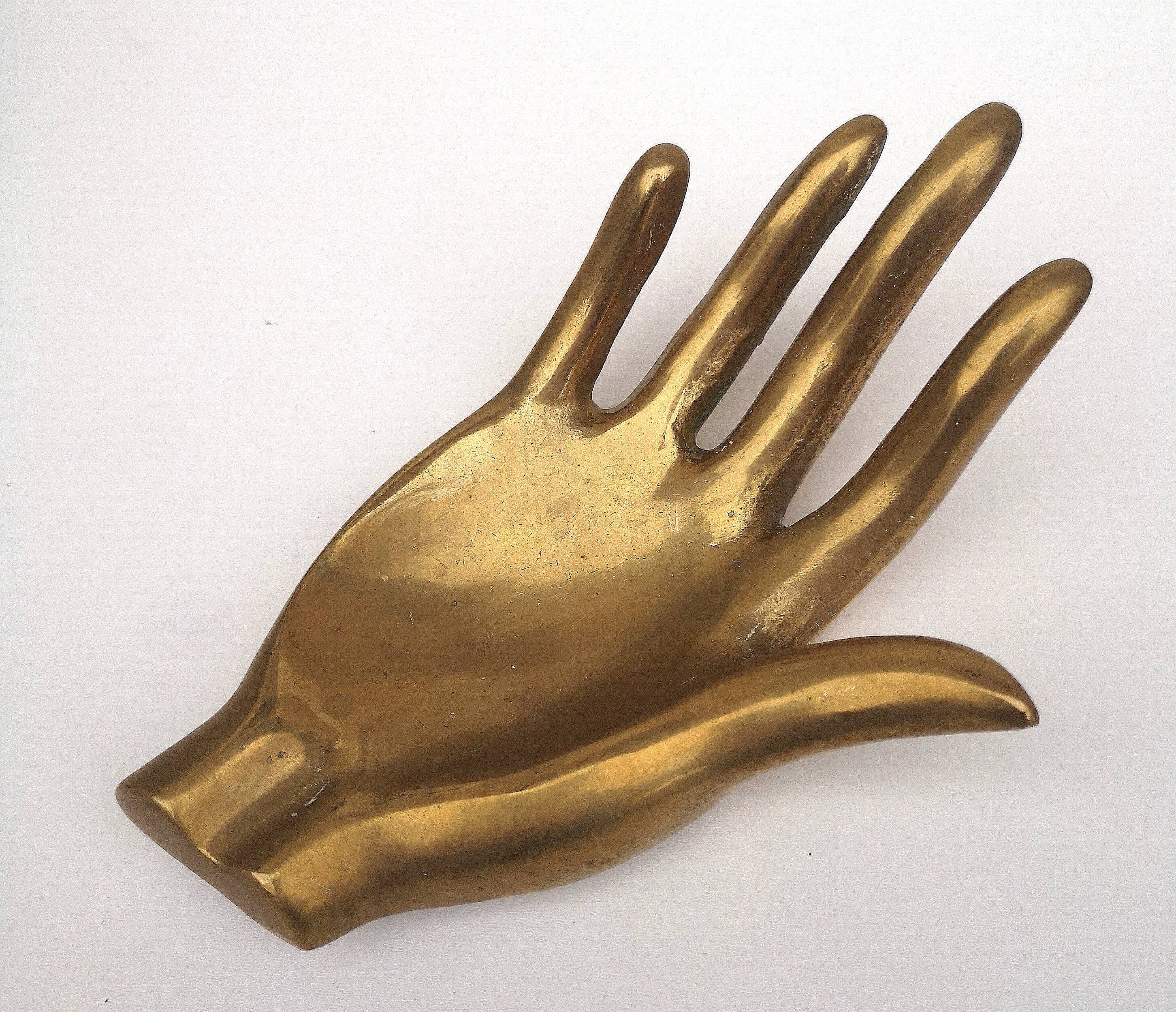 Hand, vintage ashtray, bronze