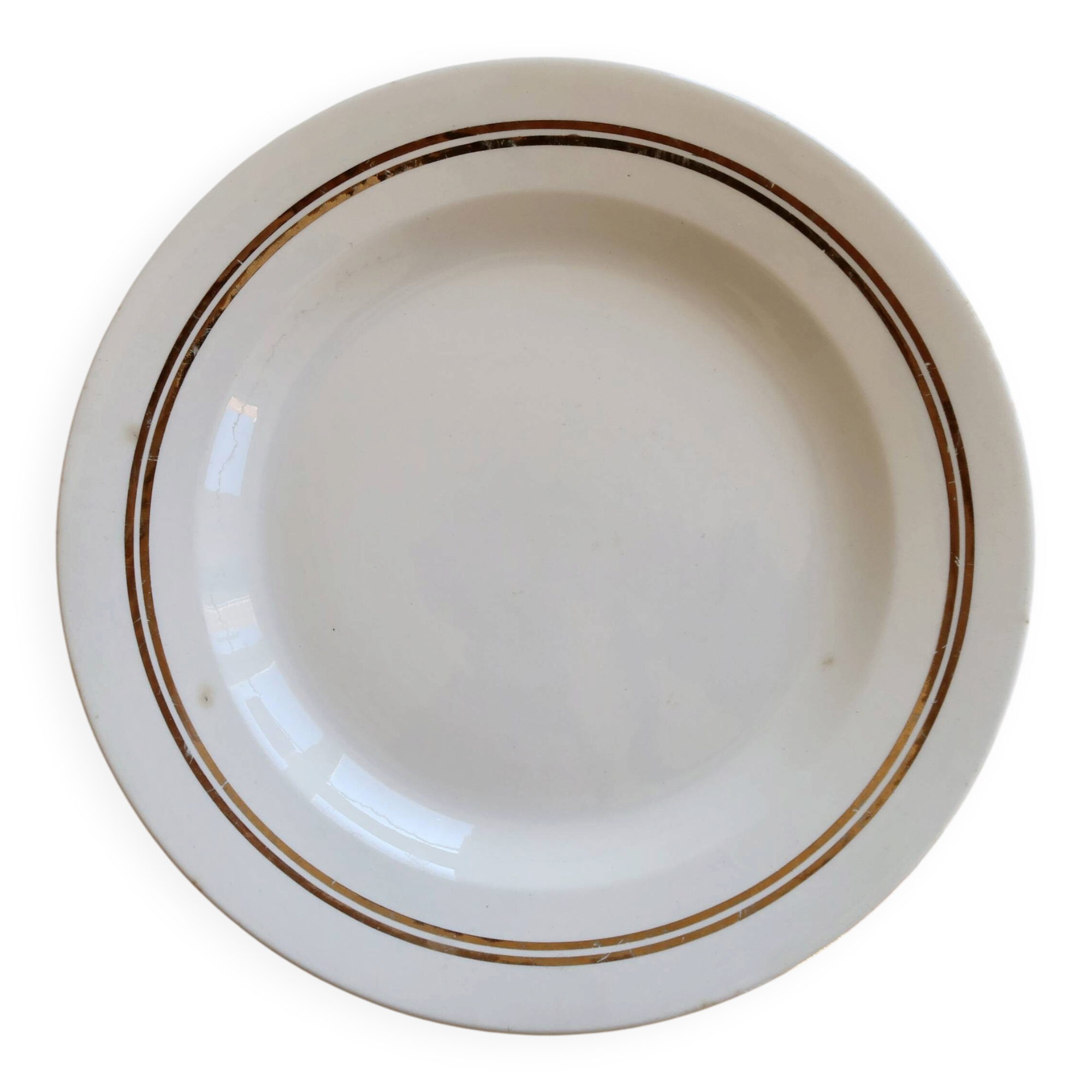 Round vintage ivory earthenware serving dish with double gold trim.