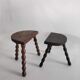 Pair of vintage tripod stools with turned wooden feet