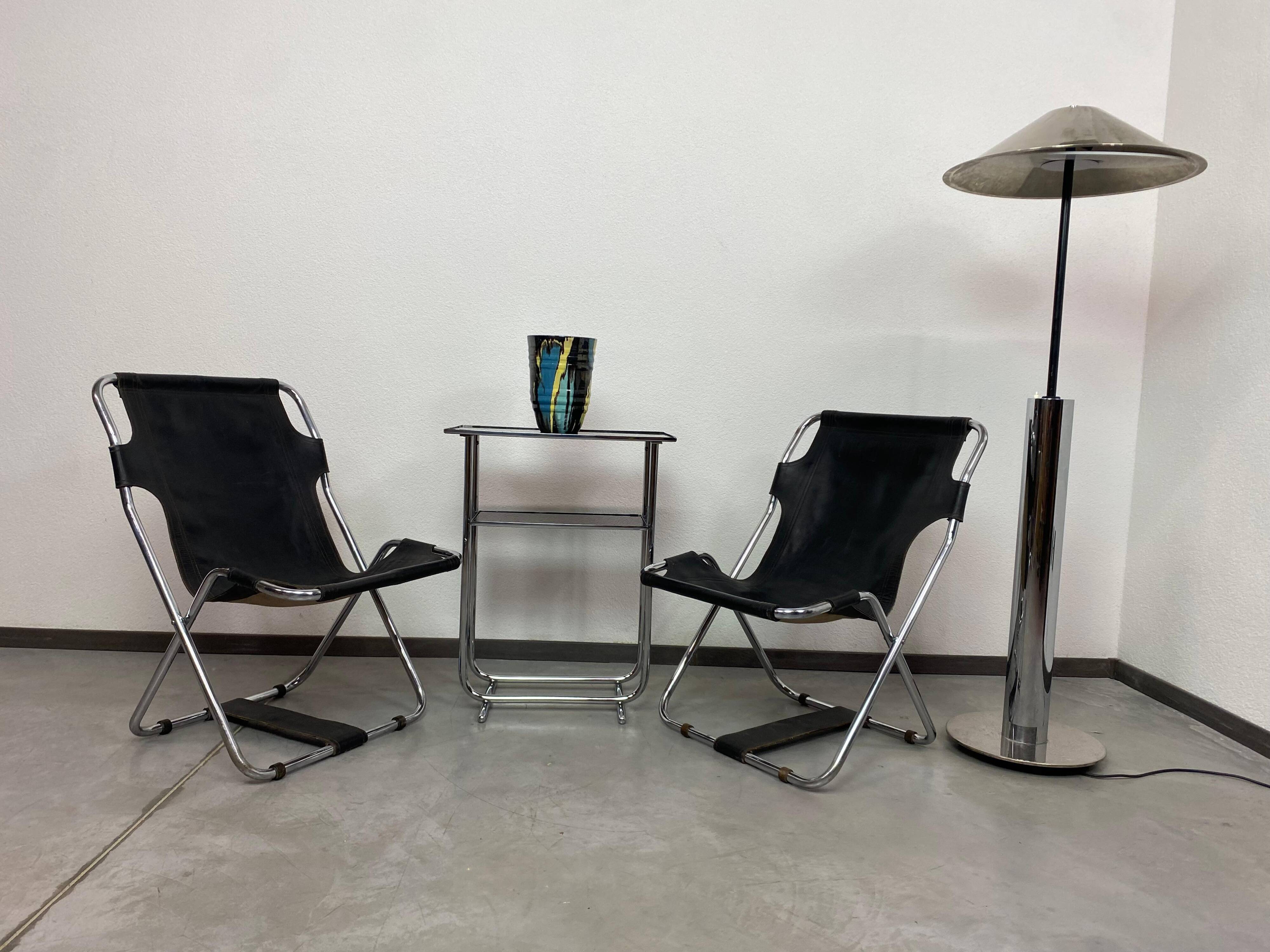 Bauhaus side table with a black glass top