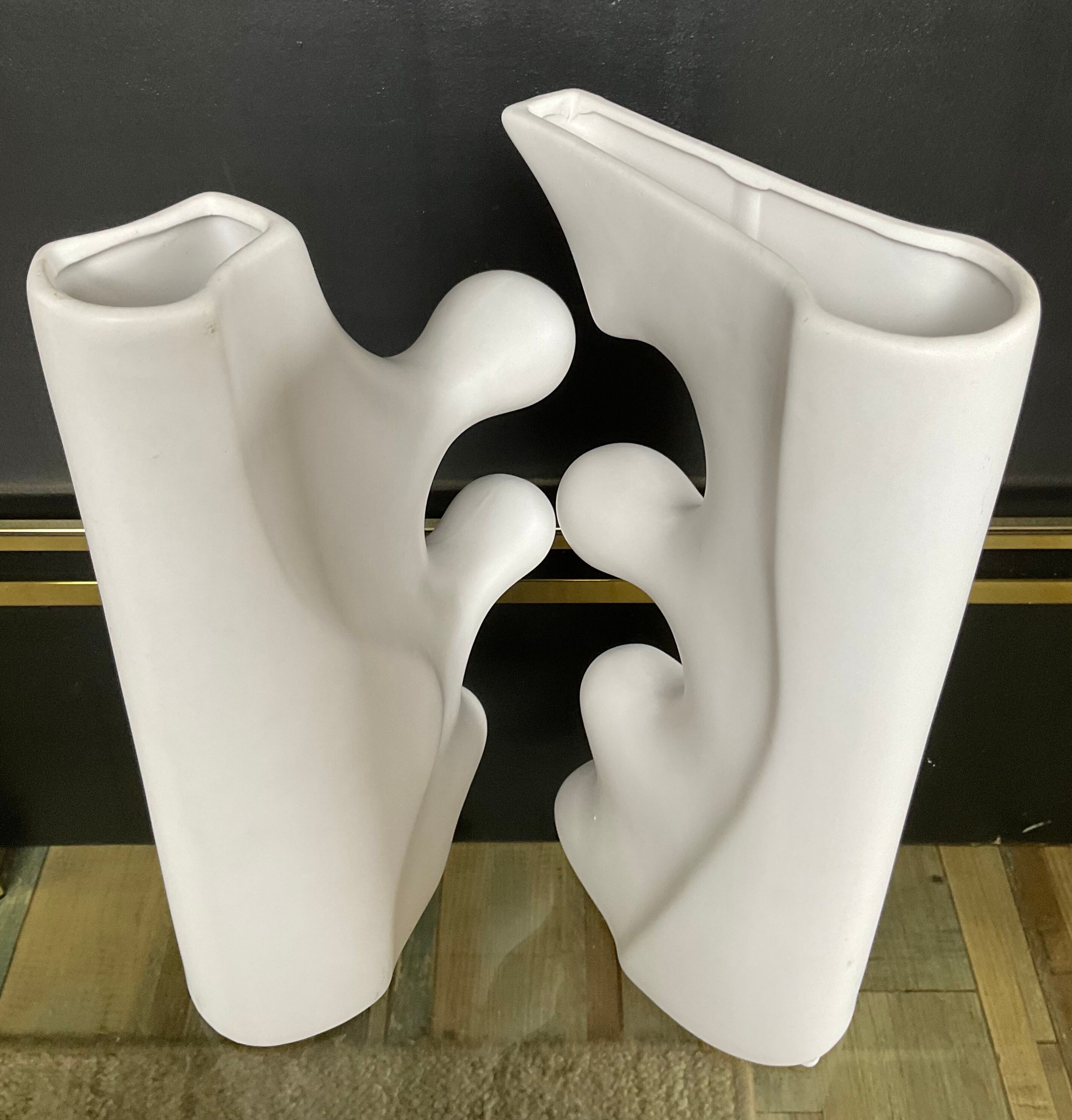 A pair of large designer ceramic vases.