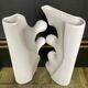 A pair of large designer ceramic vases.